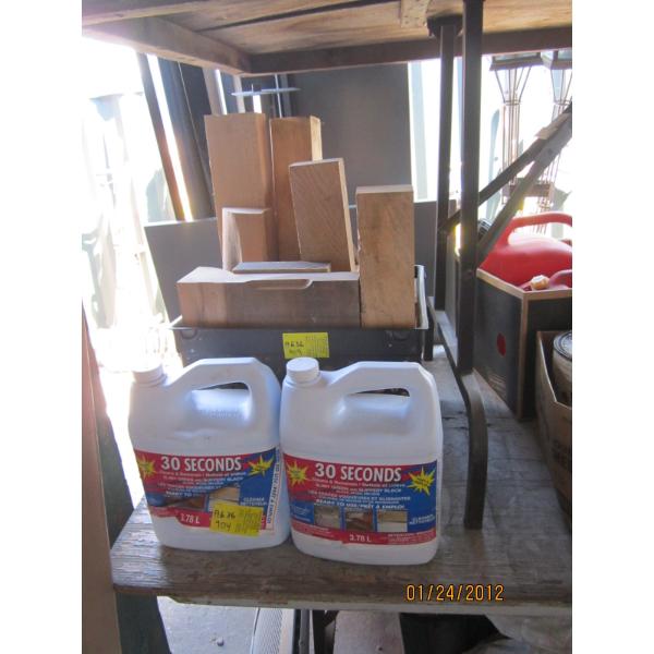 2 JUGS OF CLEANER & CRATE OF FINISHED WOOD