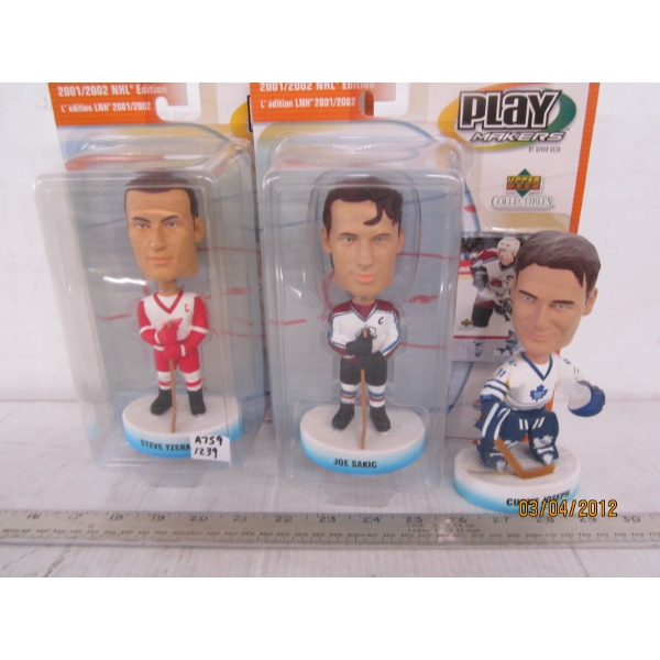 3 BOBBLE HEAD HOCKEY PLAYERS
