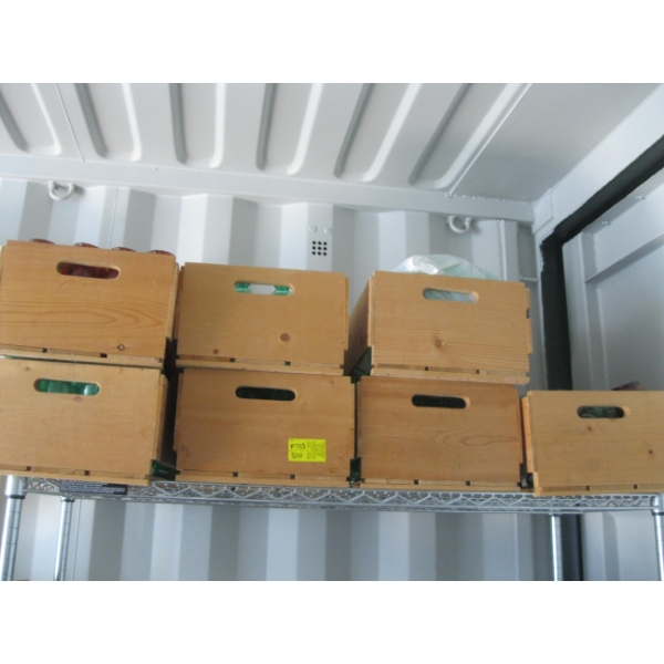7 WOOD CRATES OF PLASTIC BOTTLES