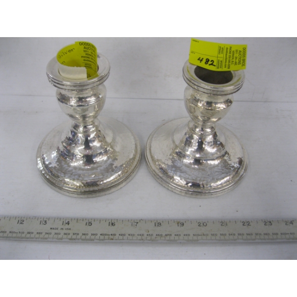 PAIR OF SILVERPLATE HAND BEATEN DERBY CANDLEHOLDERS