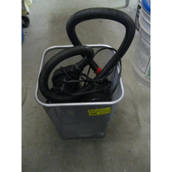 BASKET W/MISC. AIR MATTRESS PUMPS