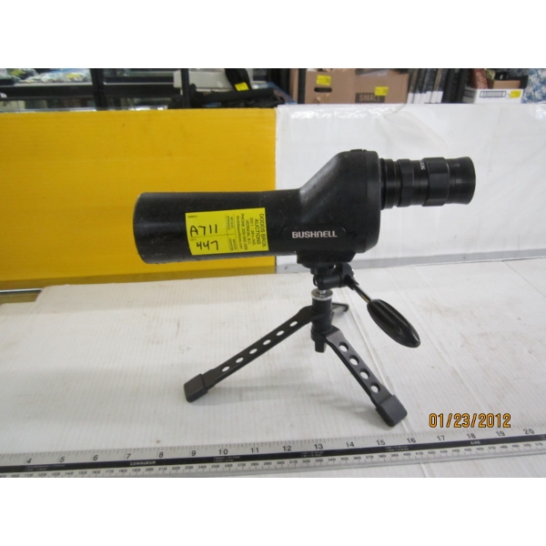 BUSHNELL SCOPE ON TRIPOD STAND