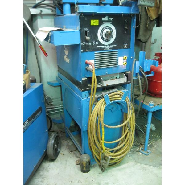 MILLER DIAL ARC 250 ACDC WELDER W/STAND & ACCESS.