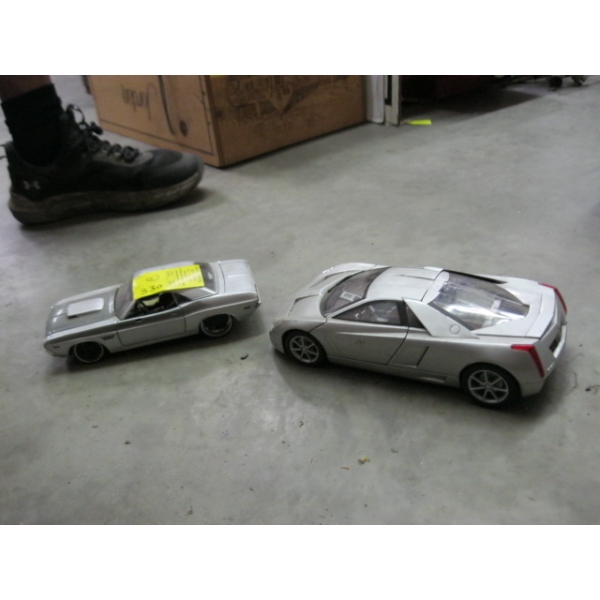 2 GREY DIECAST CARS