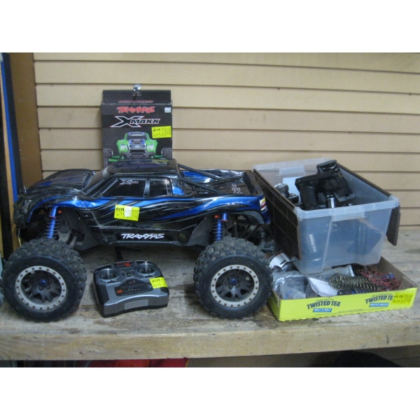 LG. REMOTE CONTROL OFF ROAD VEHICLE W/PARTS & ACCESS. & BIN OF CONTROLLERS - NO BATTERY OR CHARGER