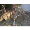 Image 1 : YARD ART W/PULL BEHIND HAY CUTTER & OLD WOODEN WAGON WHEEL