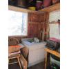 Image 1 : EVERYTHING INSIDE SM. BUILDING - POTS, SINK UNIT, DESK, TYPEWRITER, GARDEN TOOLS, SIGN, ETC.