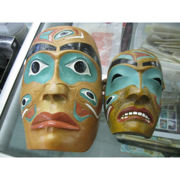 2 INDIGENOUS RESIN MASKS - MADE BY WOLF