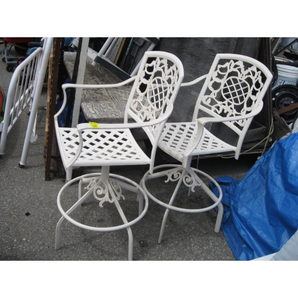 2 SWIVEL PATIO STOOLS