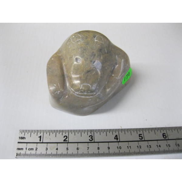 CARVING OF A SEAL HEAD, LIGHT STONE
