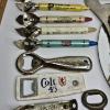 Image 8 : CARHARTT BACKPACK, POKEMON BACKPACK, VINTAGE BOTTLE OPENERS, WINDOW SCRAPERS & TIRE GAUGES