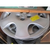 Image 4 : 4 - 15" 5 BOLT RIMS - 2 HAVE TIRES ON IT 195/65R15, TOYOTA HUBCAP COVERS