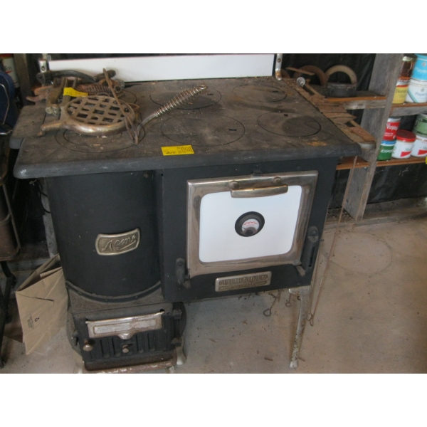 ACME FROM GUELPH STOVE CO. WOOD COOKSTOVE W/MISC. ACCESS. ON TOP