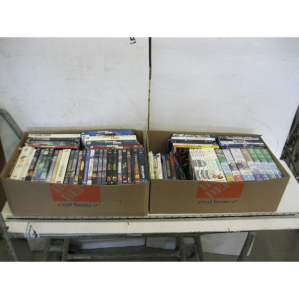 2 BOXES OF DVDs