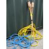 Image 1 : 3 TIKI TORCHES & 2 ROLLS OF HOSE