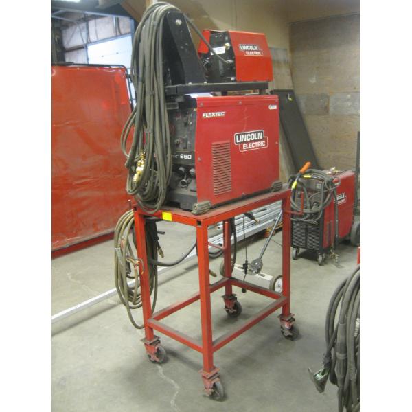 LINCOLN FLEX TECH 650 WELDER W/LINCOLN LF74 WIRE FEED ON CART W/ACCESS.
