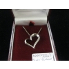 Image 1 : 10KT WHITE GOLD HEART PENDANT W/SMALL DIAMONDS W/SILVER CHAIN