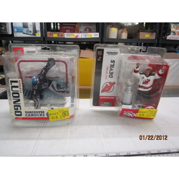 2 HOCKEY FIGURINES