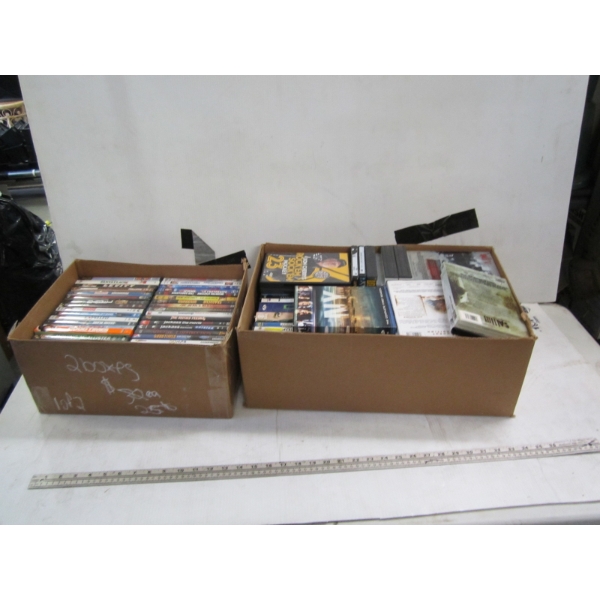2 BOXES OF DVDs