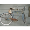 Image 1 : VINTAGE BICYCLE HANGING ON WALL