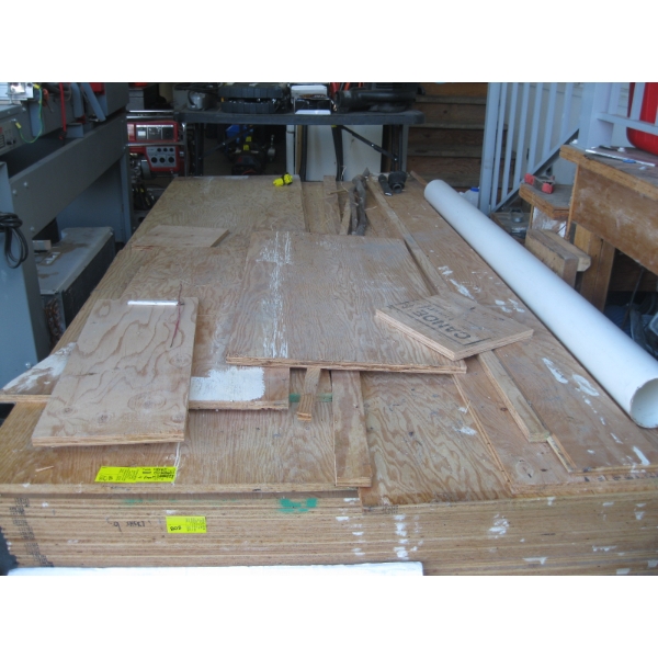 9 FULL SHEETS OF 4X8 TONGUE & GROOVE 3/4" PLYWOOD & ASST. SMALLER PIECES ON TOP
