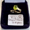 Image 1 : LADIES 10KT RING W/GREEN STONE, 3.5G, SZ 6 3/4