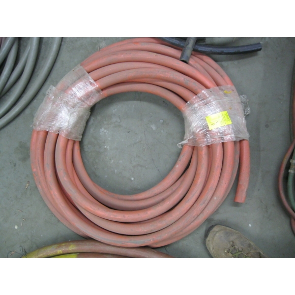 ROLL OF RED RUBBER HOSE