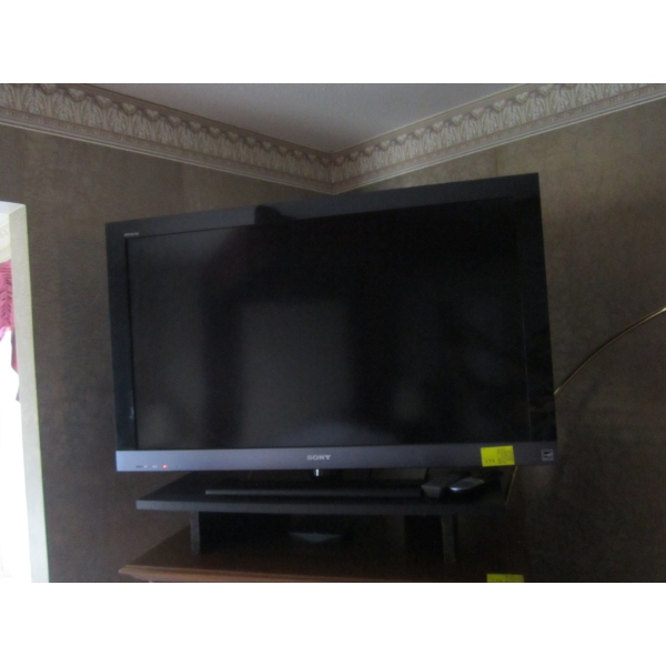 SONY 40" TV W/SM. STAND