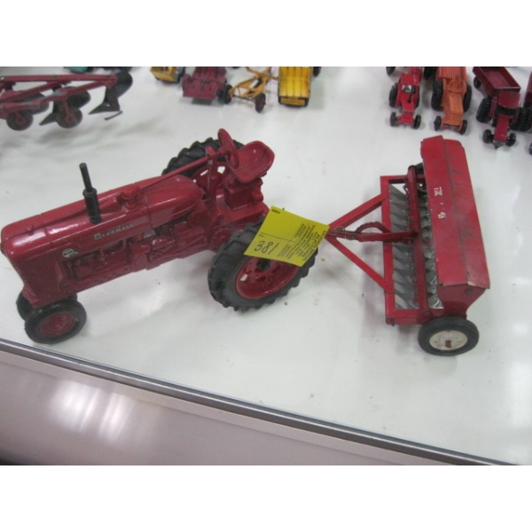 FARMALL DIECAST TRACTOR W/SEEDER