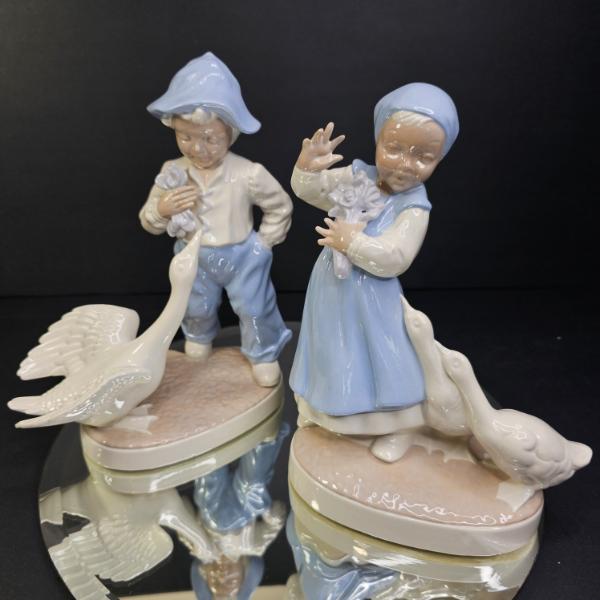 PAIR OF 8.5" BOY & GIRL W/GEESE, SIGNED BN