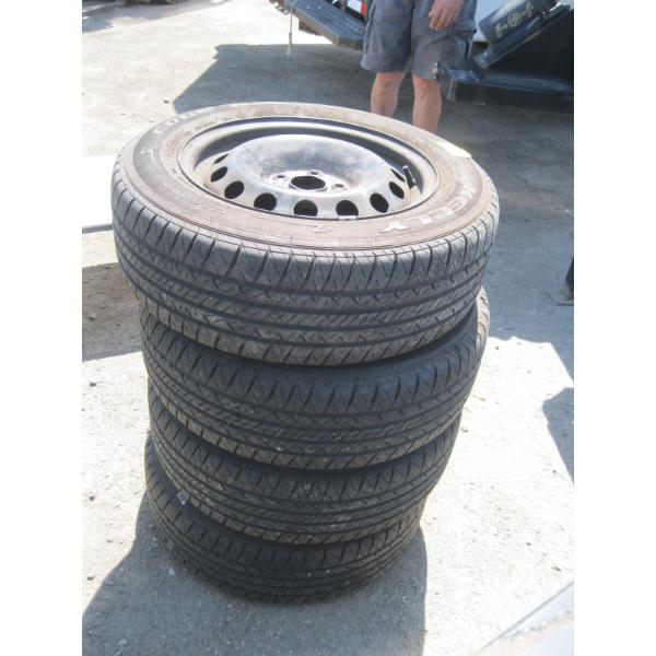 4 195/65R15 TIRES ON 5 BOLT RIMS