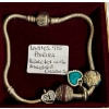 Image 1 : LADIES .925 PANDORA BRACELET W/ASST. CHARMS