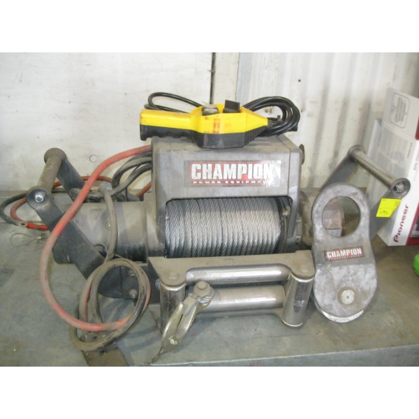 CHAMPION 12V ELECTRIC WINCH THAT IS A 9500# WINCH