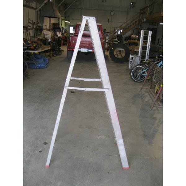 AS IS' 6' ALUM. LADDER - ONE LEG DAMAGED