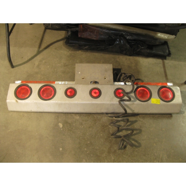 MOUNTING REAR LIGHT FOR A TRAILER OR SEMI