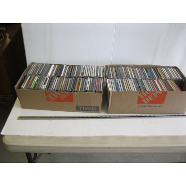 2 BOXES OF CDs