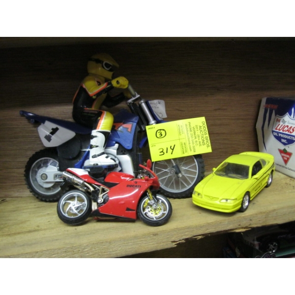 2 MOTORCYCLES & A SMALL DIECAST MUSTANG CAR
