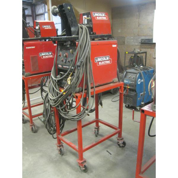 LINCOLN FLEX TECH 650 WELDER W/LINCOLN LF74 WIRE FEED ON CART W/ACCESS.