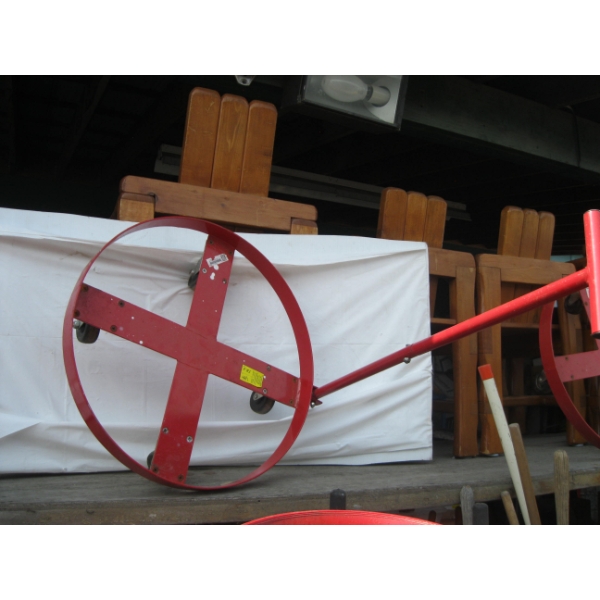 RED METAL BARRELL ROLLER W/HANDLE