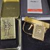 Image 1 : 2 LIGHTERS, LEAGUE OF LEGENDS, GOLD COLORED PISTOL, WORKING, W/ORIGINAL BOX