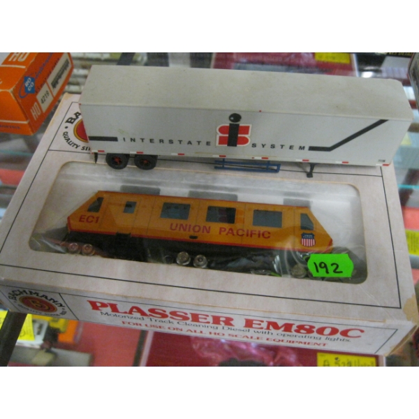 SMALL UNION PACIFIC TRAIN CAR & A PLASTIC SEMI TRAILER