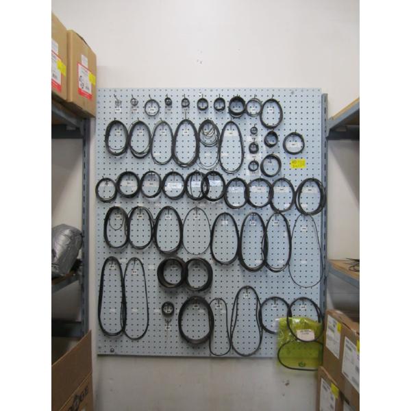 PEGBOARD FULL OF RUBBER RINGS