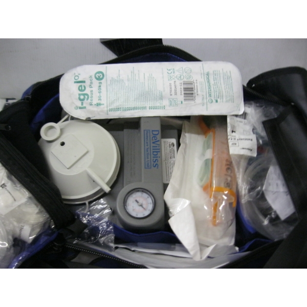 BLUE DUFFLE BAG W/HOME CARE SUCTION UNIT