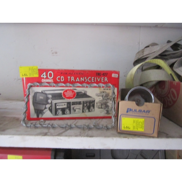 40 CHANNEL CB RADIO & BOX OF MISC. WHEEL NUTS, CAPS, ETC.