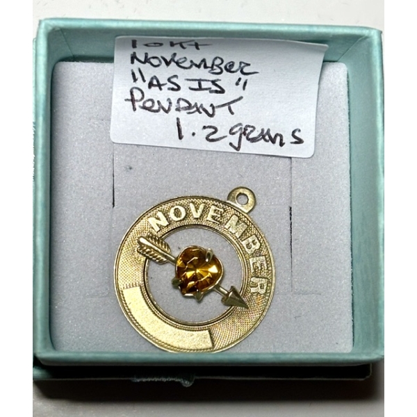 "AS IS" 10KT NOVEMBER PENDANT, 1.2G