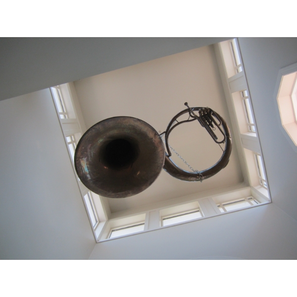 TUBA HANGING IN BATHROOM