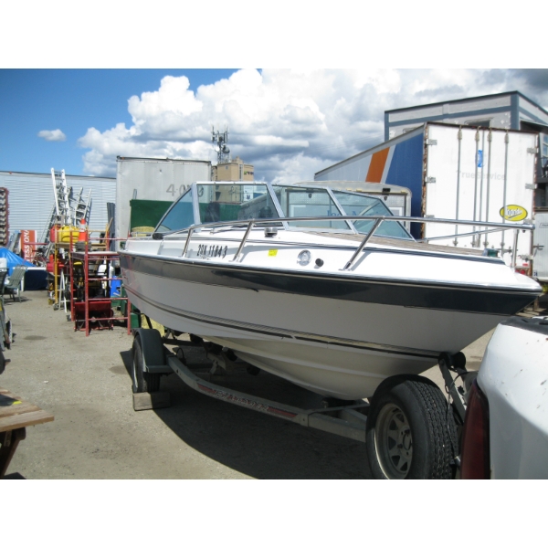 MALIBU 175 BOAT W/JOHNSON 140 MOTOR ON EZ LOAD TRAILER