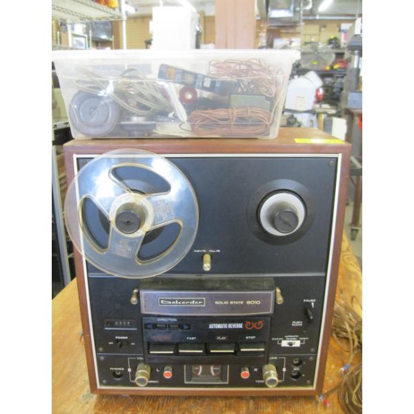 DOKOREER SOLID STATE 610 REEL TO REEL TAPE RECORDER W/PLASTIC BIN OF ACCESS.