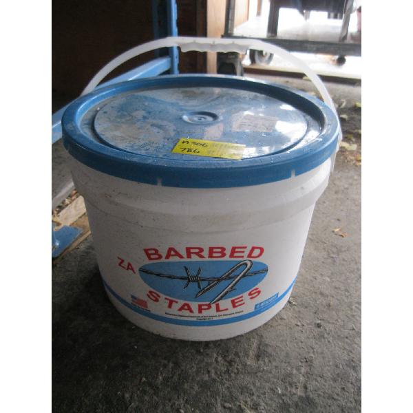 PAIL OF BARBED STAPLES