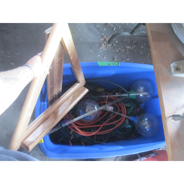 BIN OF MISC. EASEL STAND, EXTENSION CORD, LED CHRISTMAS LIGHTS, ETC.